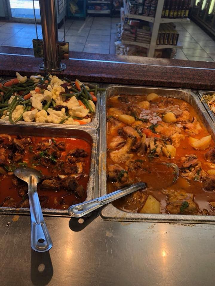 Authentic Latin food pernil pollo guisado at Jak's Deli Speonk NY